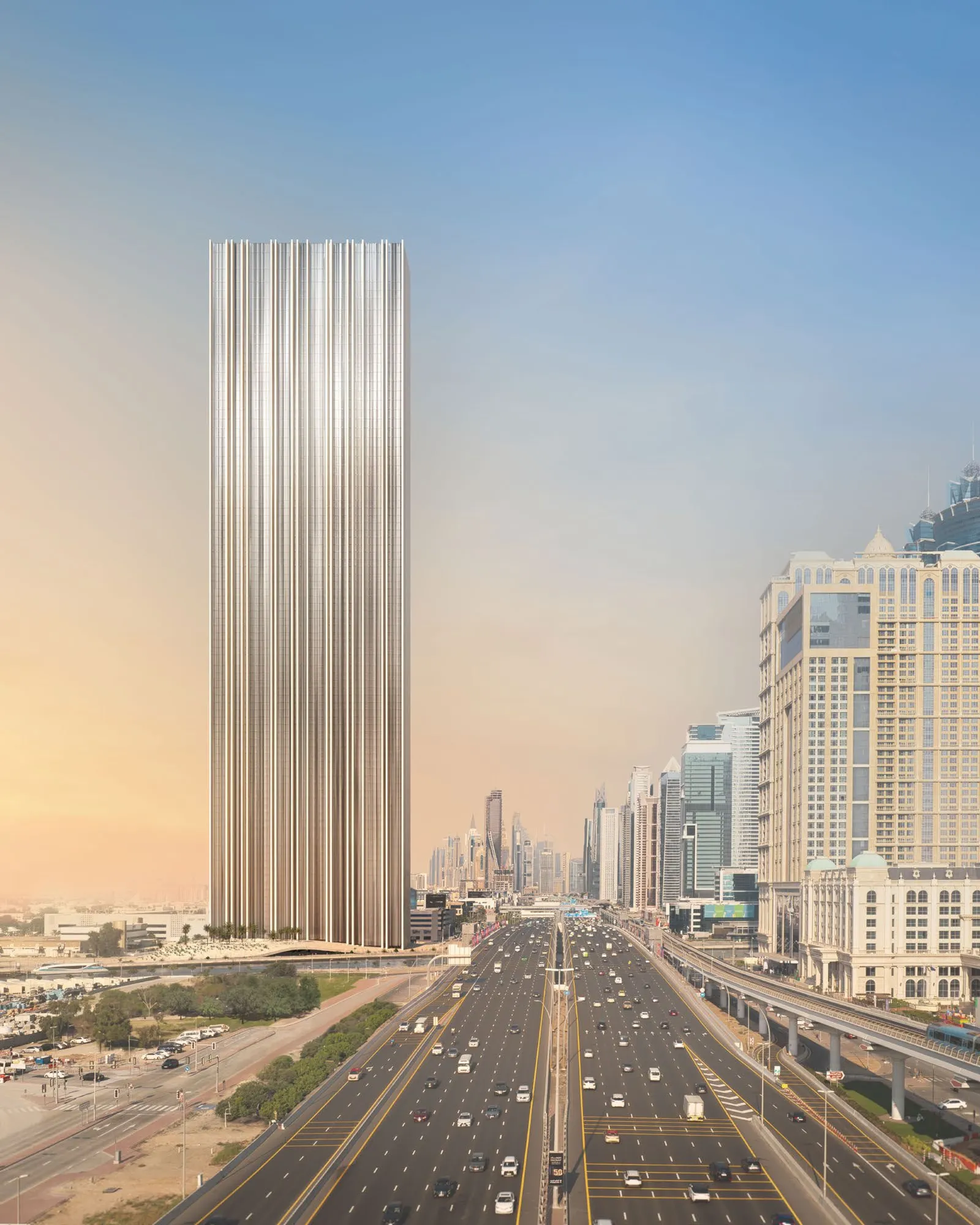 The tall, slender tower beside Sheikh Zayed Road at sunrise